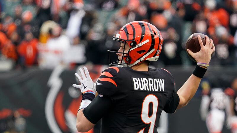 Cincinnati Bengals quarterback Joe Burrow throws before an NFL wild-card playoff football game...
