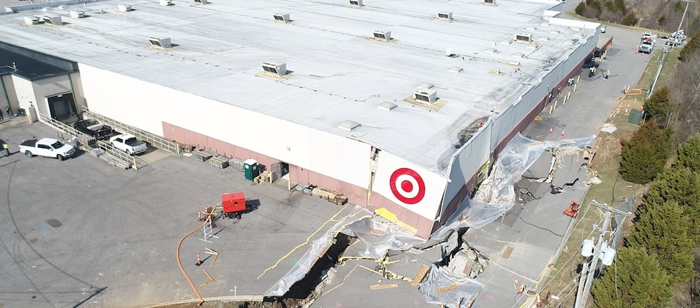 Hillside behind a Target location in Barboursville, West Virginia slips away.