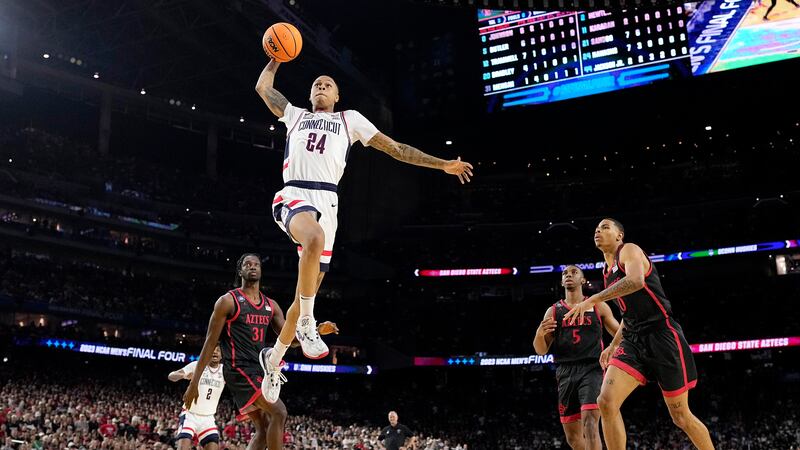 Connecticut guard Jordan Hawkins shoots against San Diego State during the second half of the...