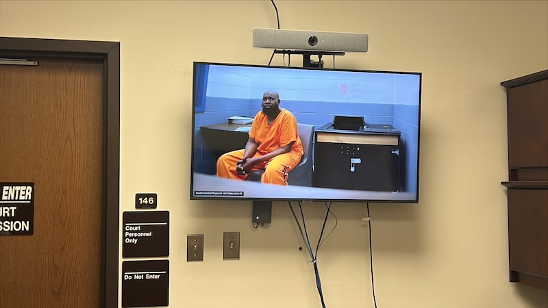 Douglas Charles Hill, 52, was arrested and arraigned on a malicious wounding charge on Tuesday...