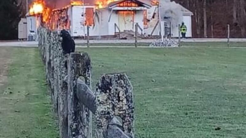 Firefighters battle flames at church.