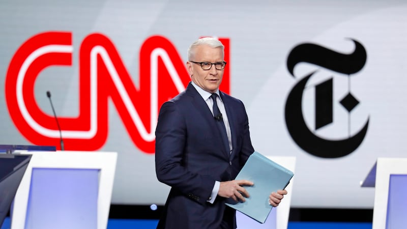Anderson Cooper, CNN anchor, walks onstage for a Democratic presidential primary debate hosted...