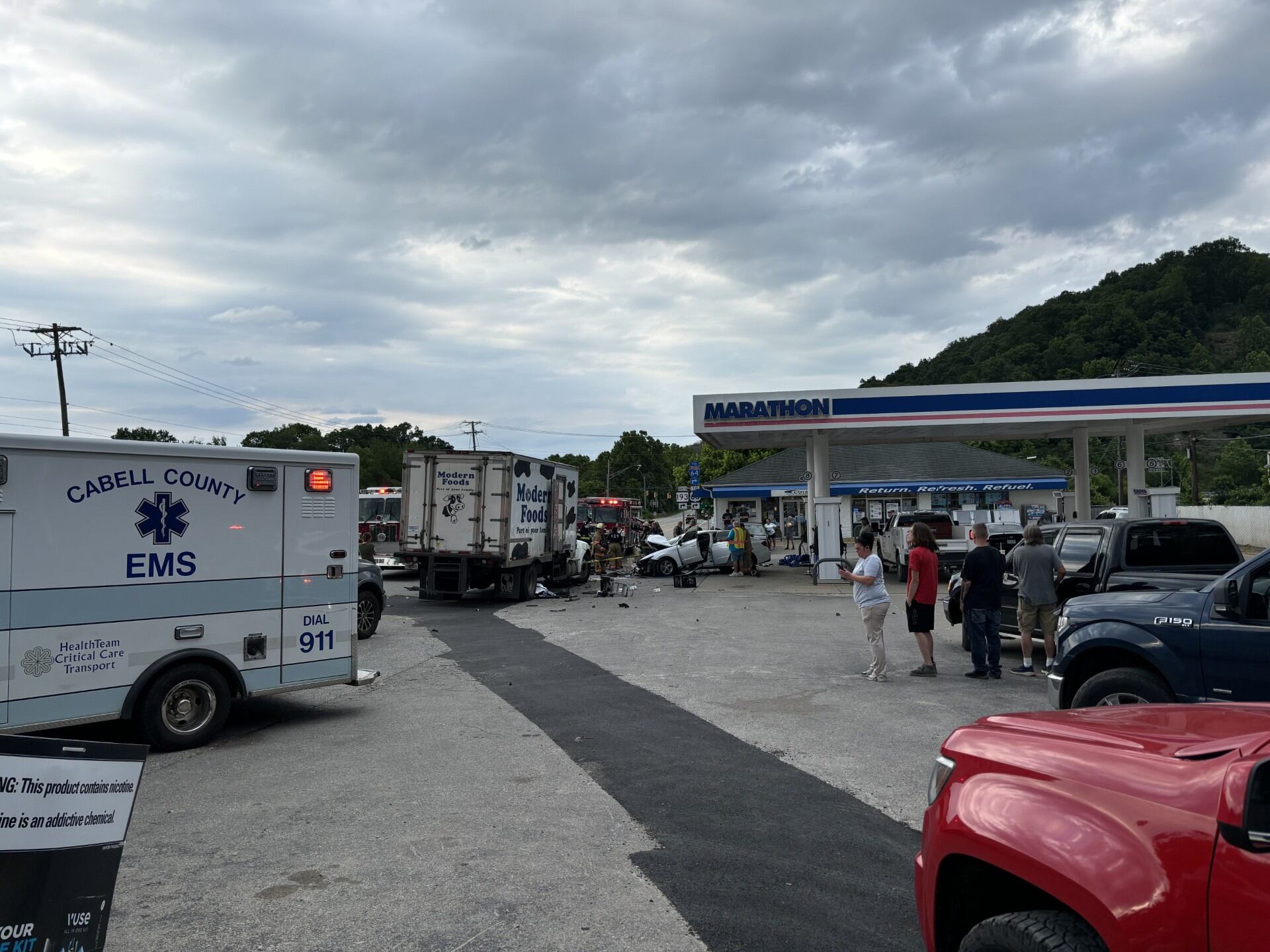 Vehicle crashes into milk truck in gas station parking lot - Vimarsana News